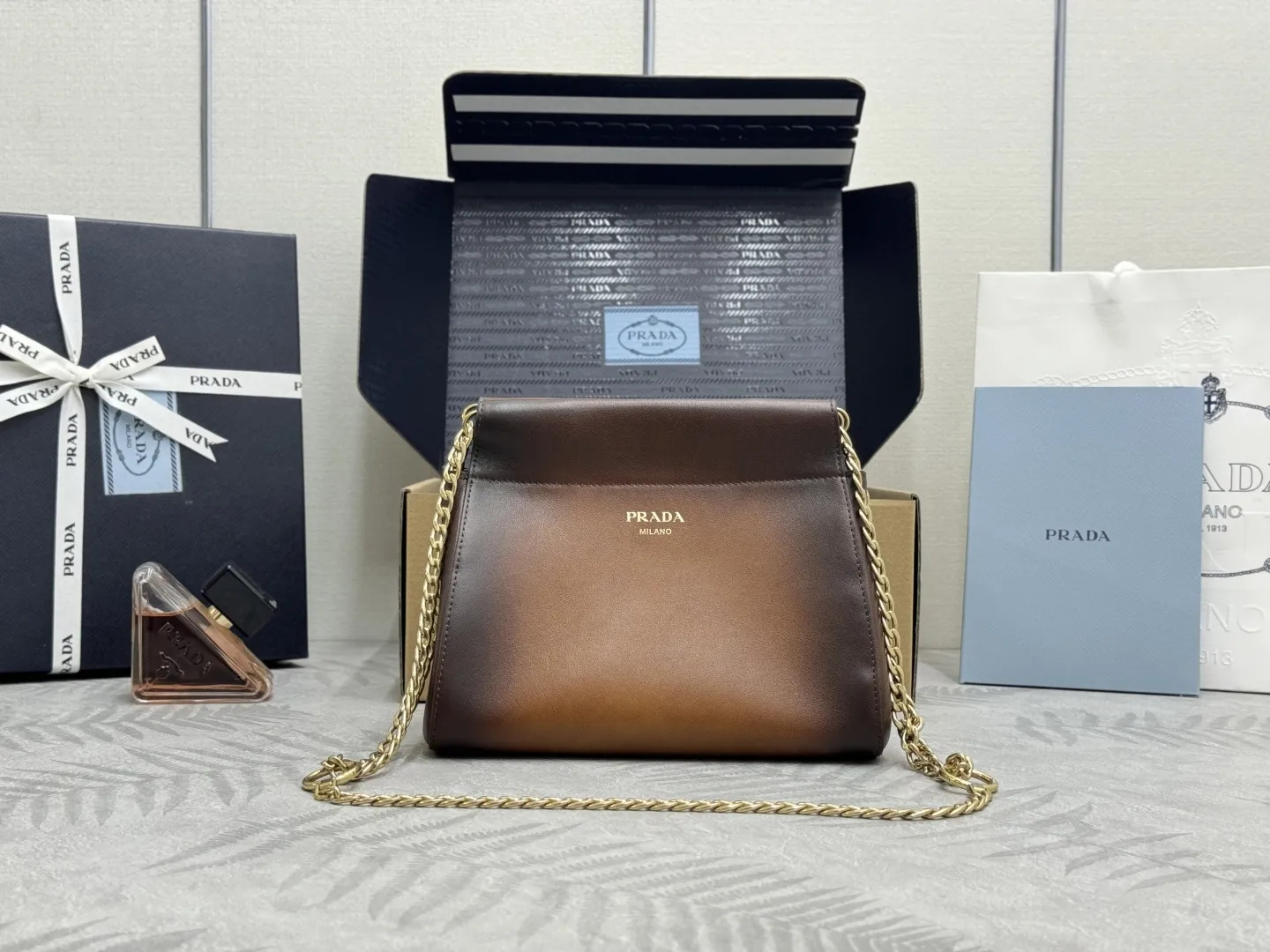 Prada Enchaîné Distressed Leather Mini Chain Bag D91016239