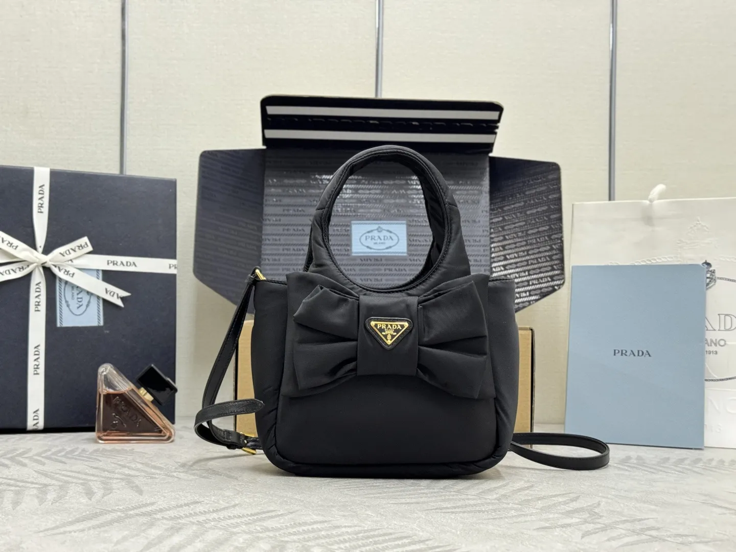Prada Bow-Detail Padded Nylon Shoulder Bag D75016307