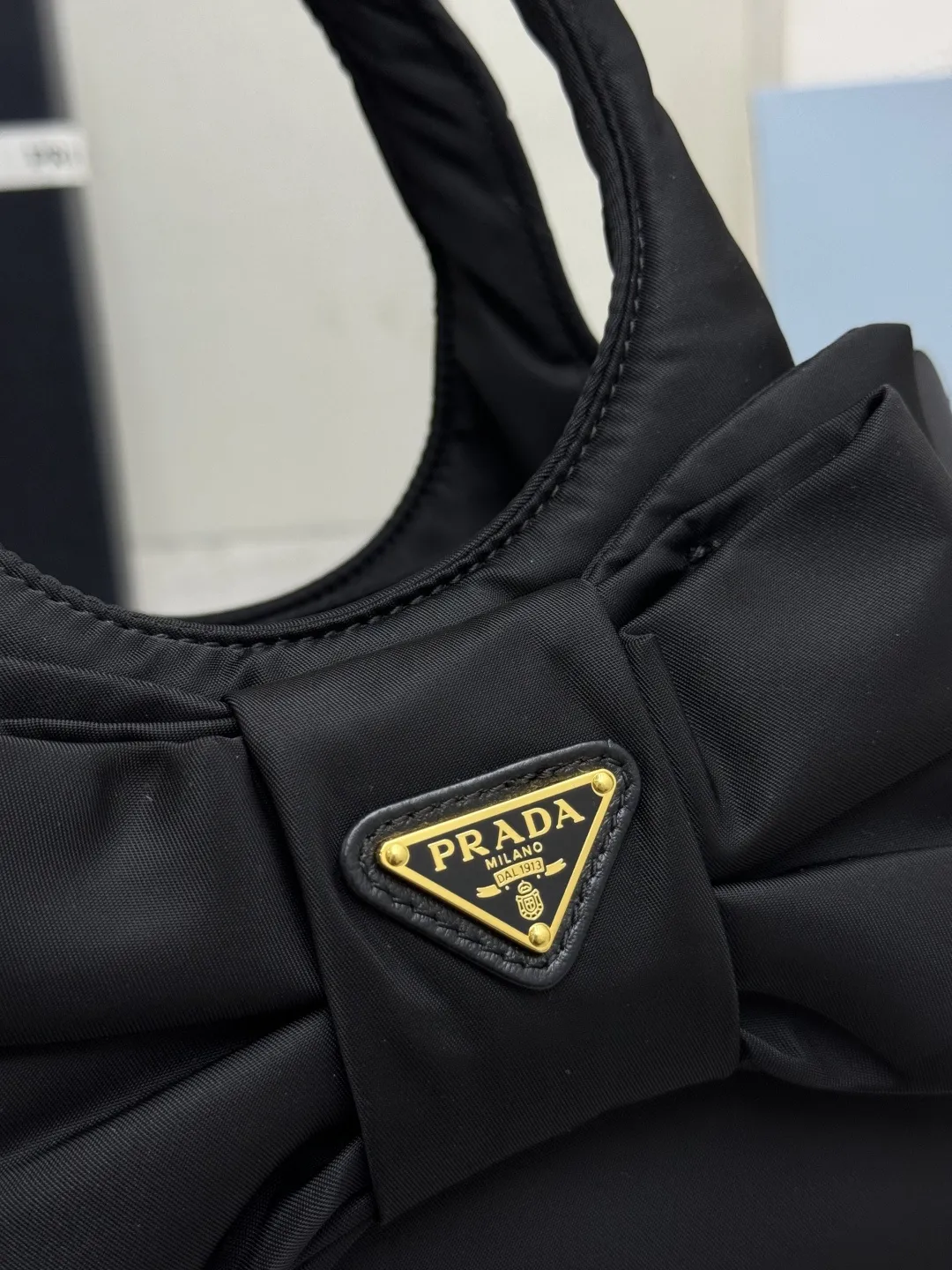 Prada Bow-Detail Padded Nylon Shoulder Bag D75016307 — view 7
