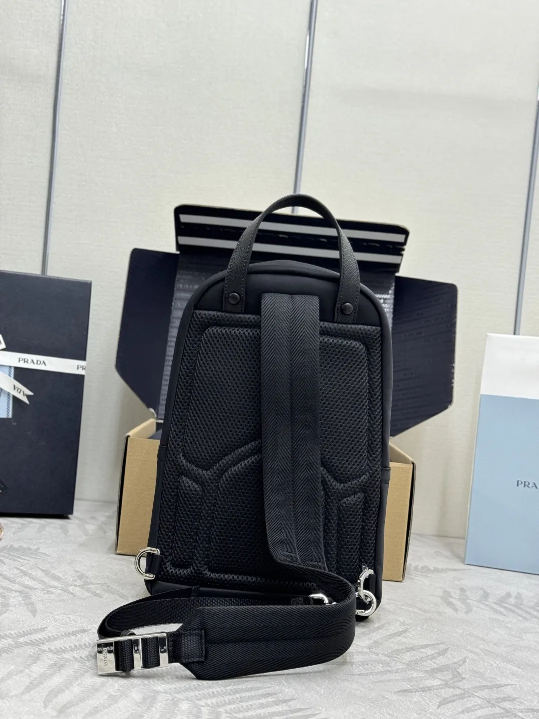 Re-Nylon and Saffiano Leather Sling Backpack D68016313 — view 2