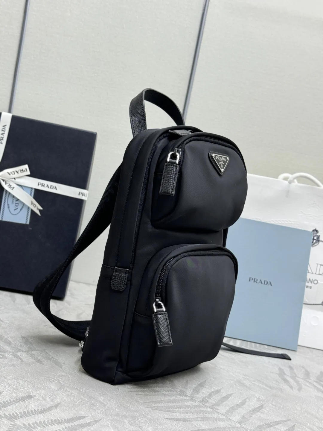 Re-Nylon and Saffiano Leather Sling Backpack D68016313 — view 4