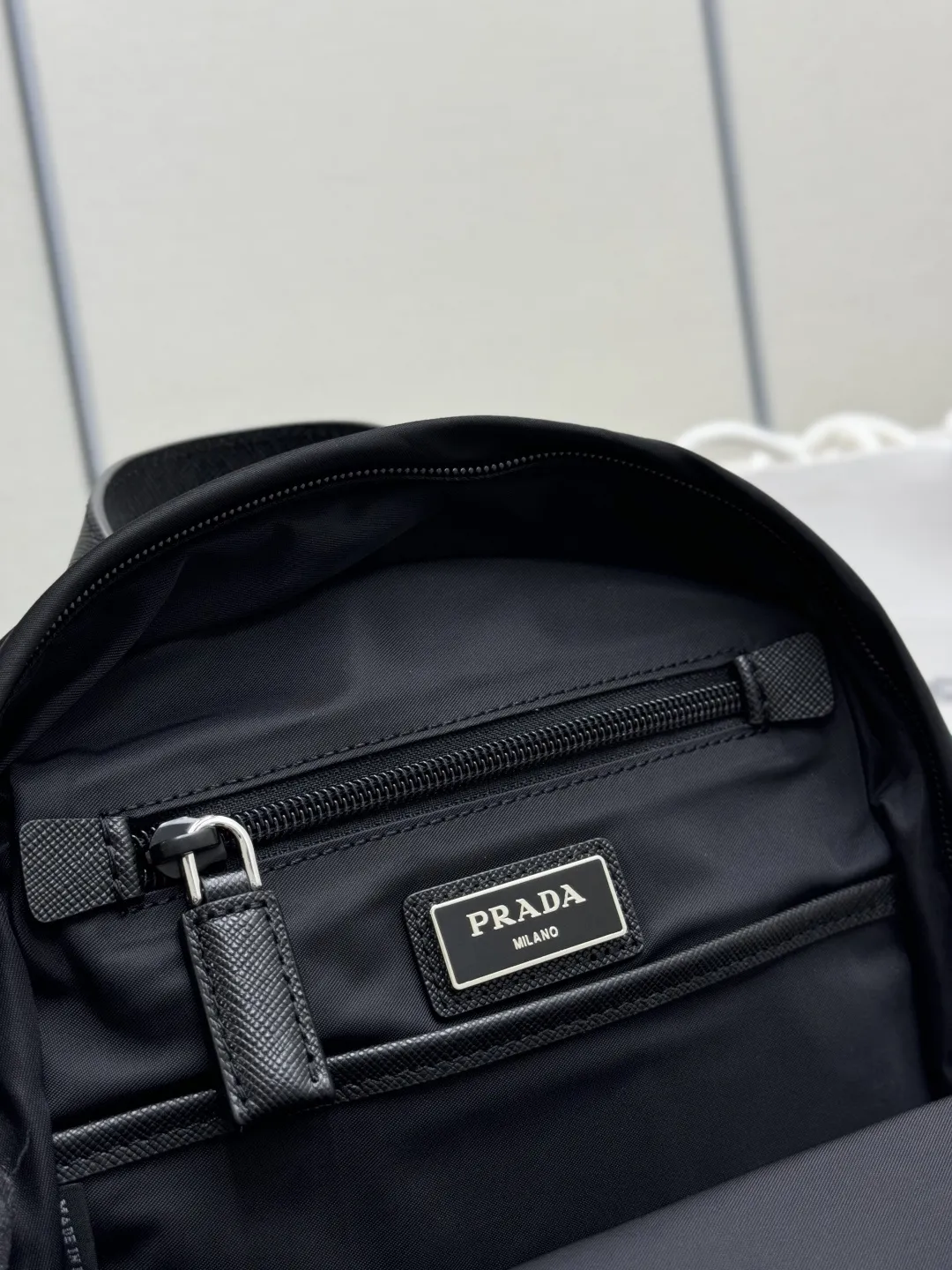 Re-Nylon and Saffiano Leather Sling Backpack D68016313 — view 9