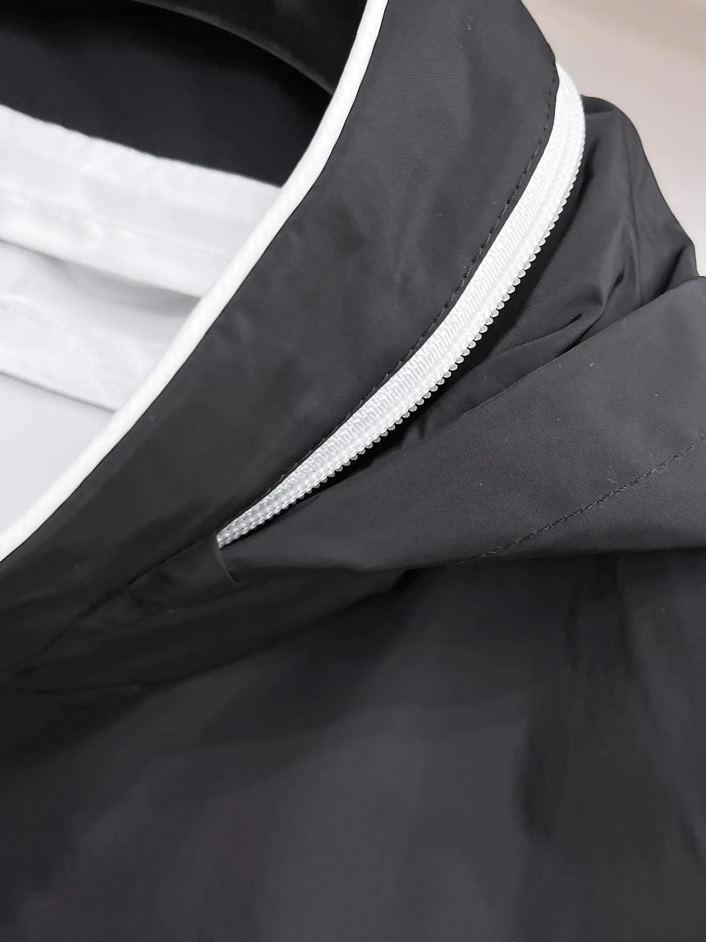 Logo-Appliquéd Hooded Shell Jacket D33014356 — view 10