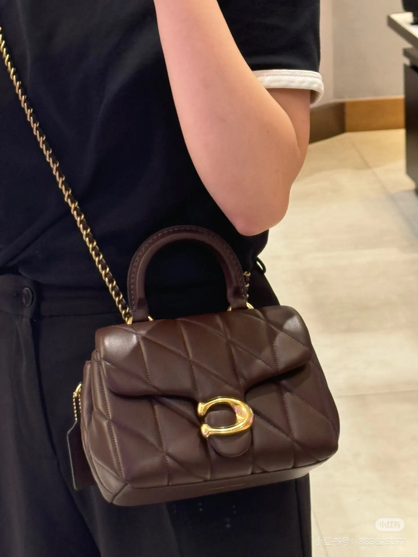 Tabby Quilted Leather Top Handle Bag D34018347