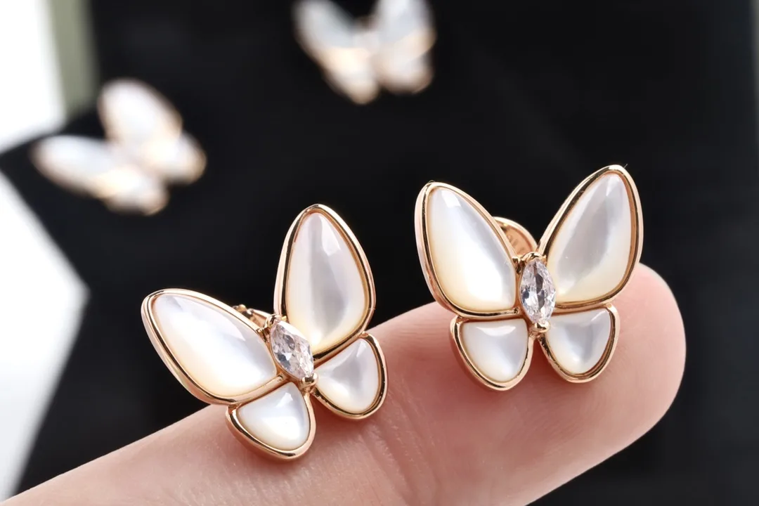 Two Butterfly Mother-of-Pearl Stud Earrings D22516930 — view 3