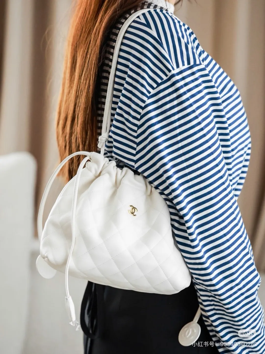 Chanel Quilted Leather Drawstring Bucket Bag D34018087 — view 9