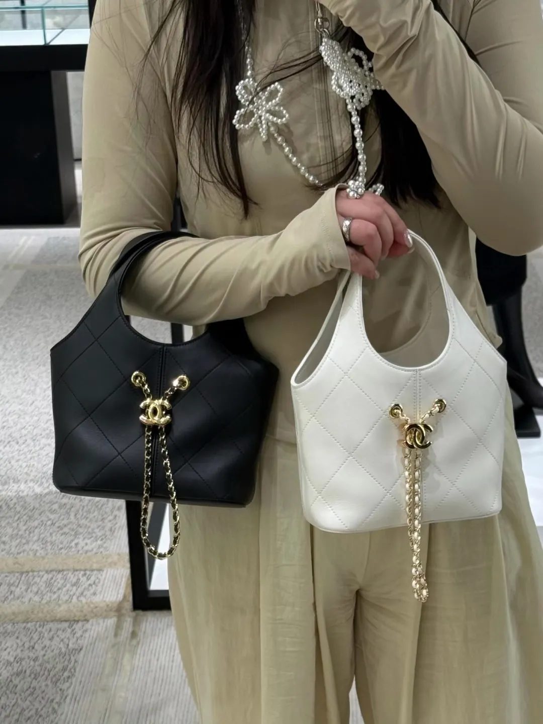 Chanel Quilted Leather Bucket Bag D28518506 — view 8