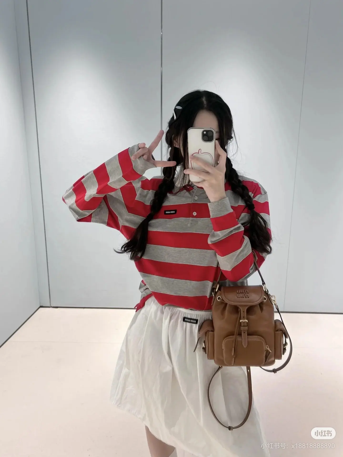 Striped Long-Sleeve Polo Shirt D16522515